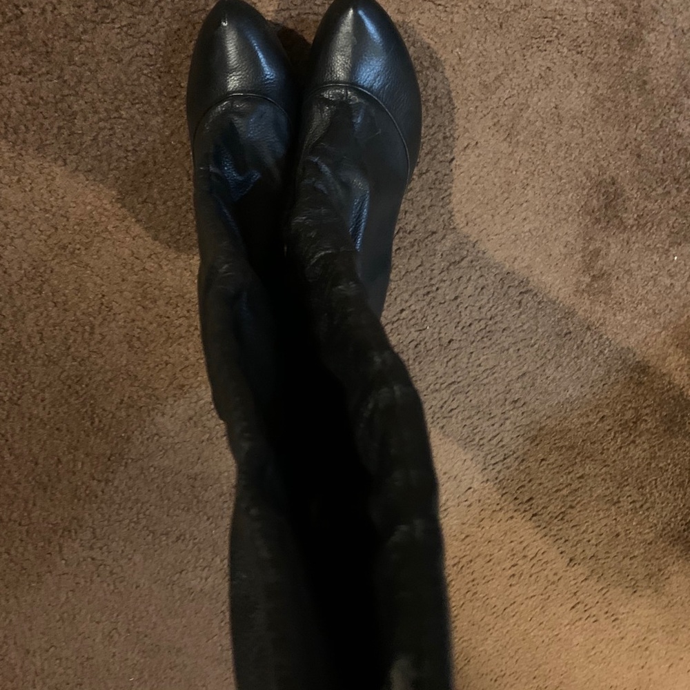 Black leather knee boots